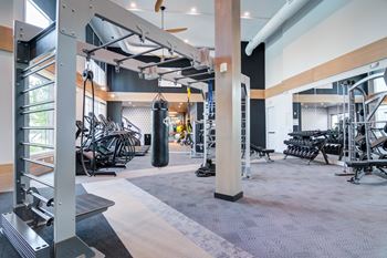 24 Hour fitness center with yoga room